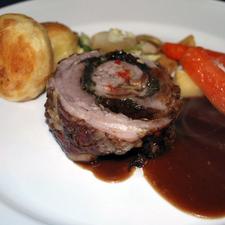 Roast Breast of Lamb filled with Prunes, Garlic & Herbs