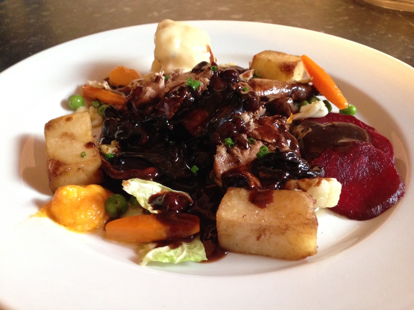 Pheasant cooked in a Sauce of Cassis with Woodland Mushrooms